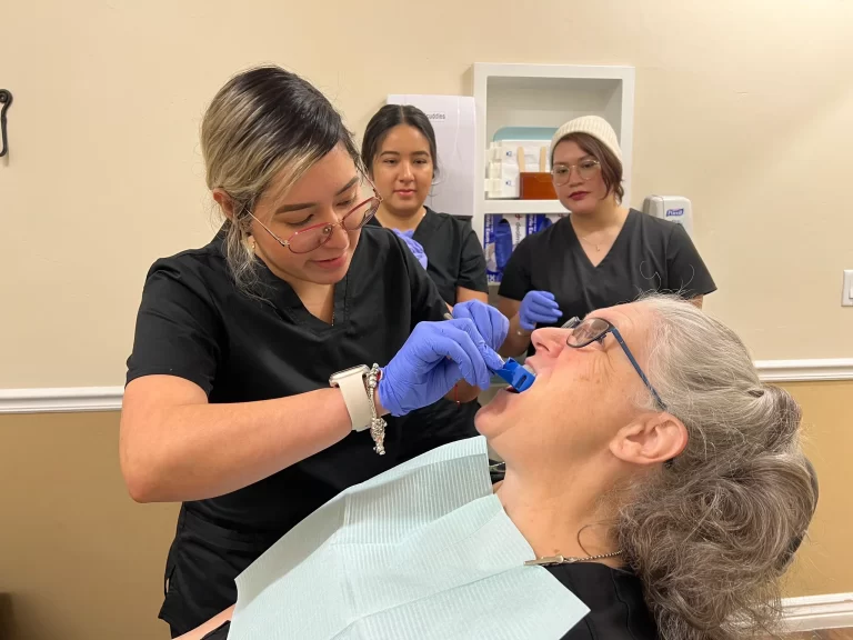 Dental assistant in training